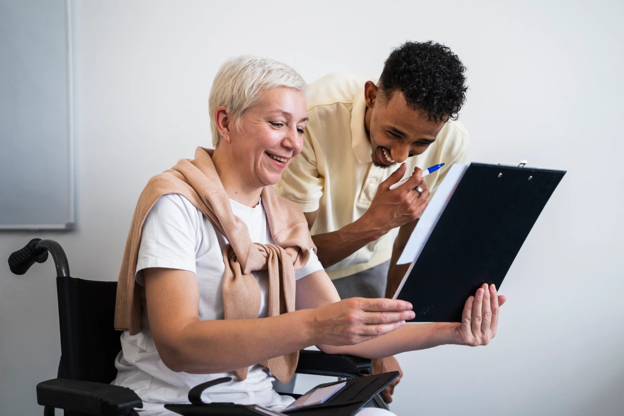 side-view-smiley-woman-wheelchair